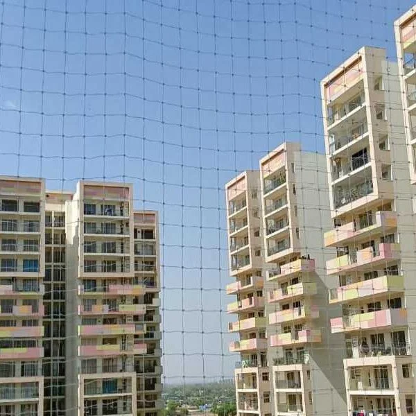 Bird Netting Installation on warehouse facade, Pune